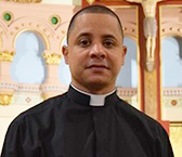 Father Castillo on altar