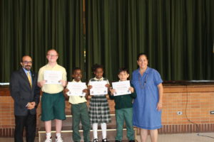 Pictures of students holding their awards