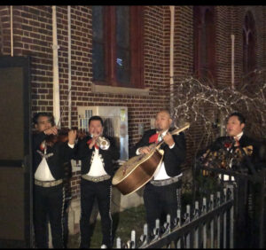 Mariachi band plays outside church