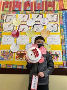 Queens Catholic School Student Celebrates Chinese New Year