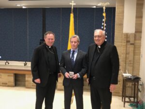Bishop Dimarzio and Bishop Sweeney next to Sean Conaboy