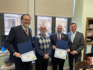 Dr. Miguel Martinez-Saenz, Bay Ridge Catholic Academy Board Chairman Vincent Iannelli, Robert Oliva, Assistant Vice President at St. Francis College, and Gary Williams, Principal of Bay Ridge Catholic Academy.
