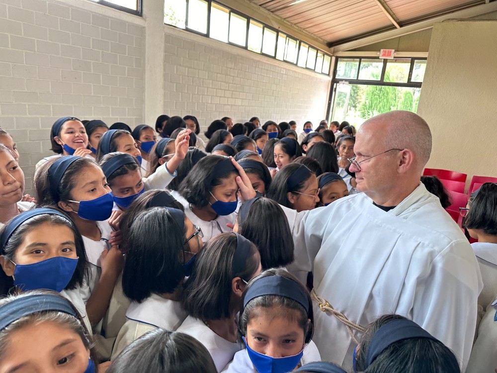 Fr. OConnor blesses girls 1